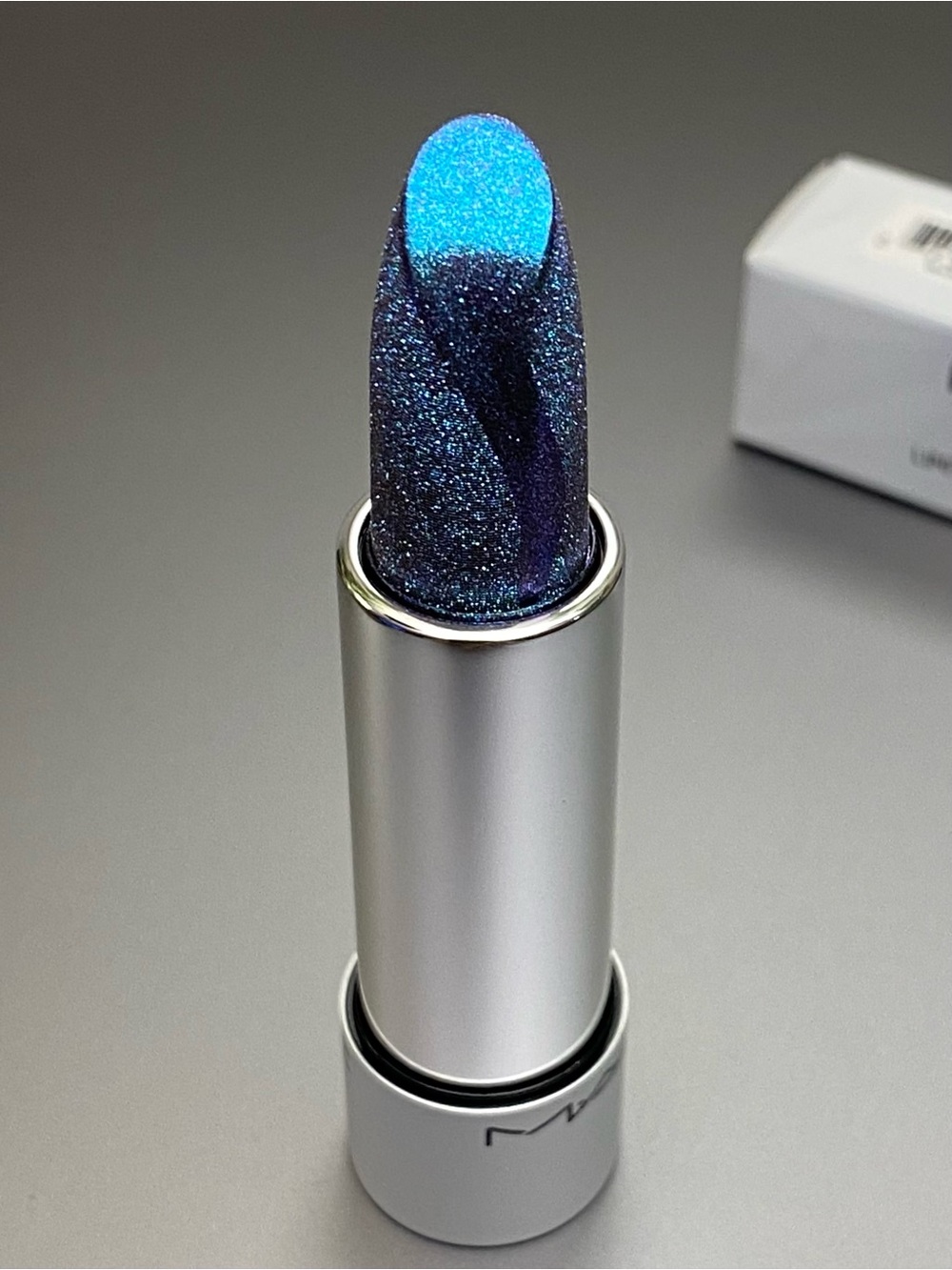 MAC “Shiver Shimmy” Fizzy Feels Lip Balm